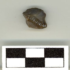 Colour photograph of a silex gunflint on which a Borden Code can be read.